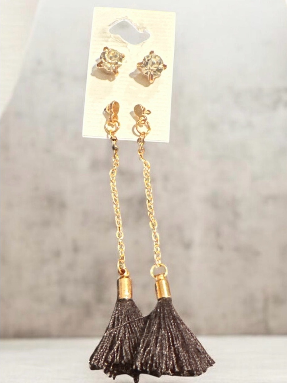 Gold Tone Long Chain Earrings with Black Tassels
277